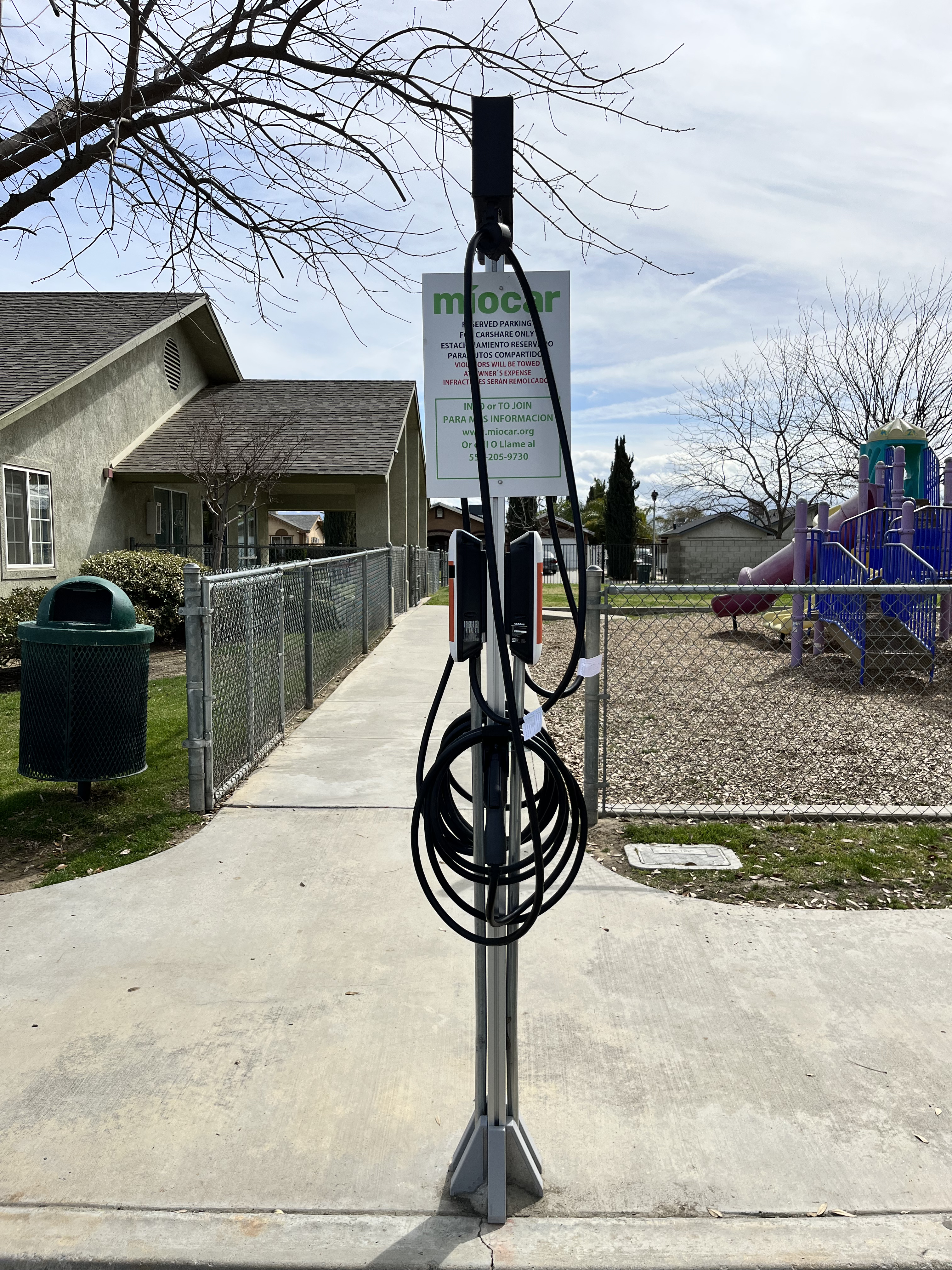 EV charging station at Caliente Creek Apartments - Arvin